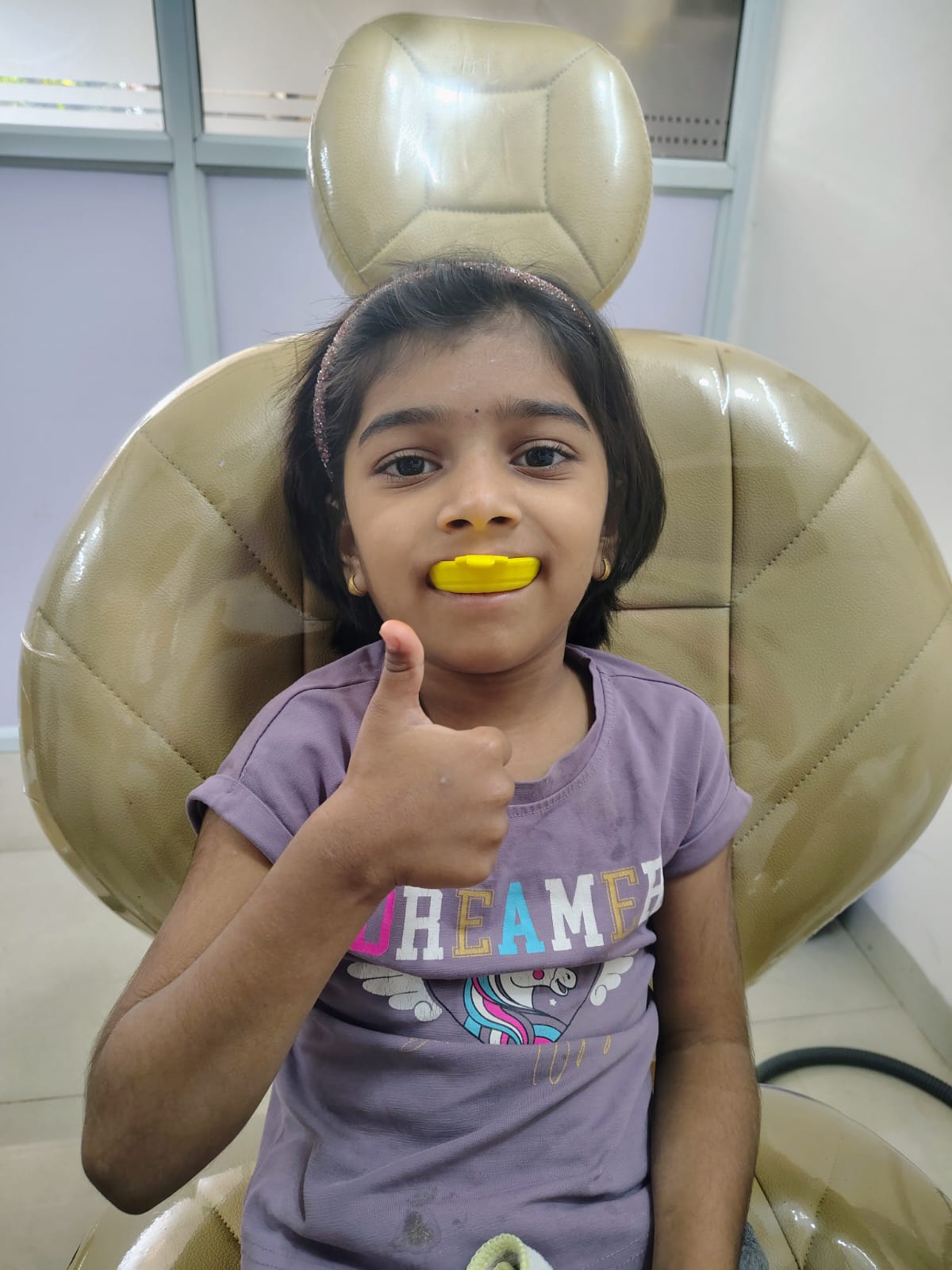 Young patient during a fluoride application
