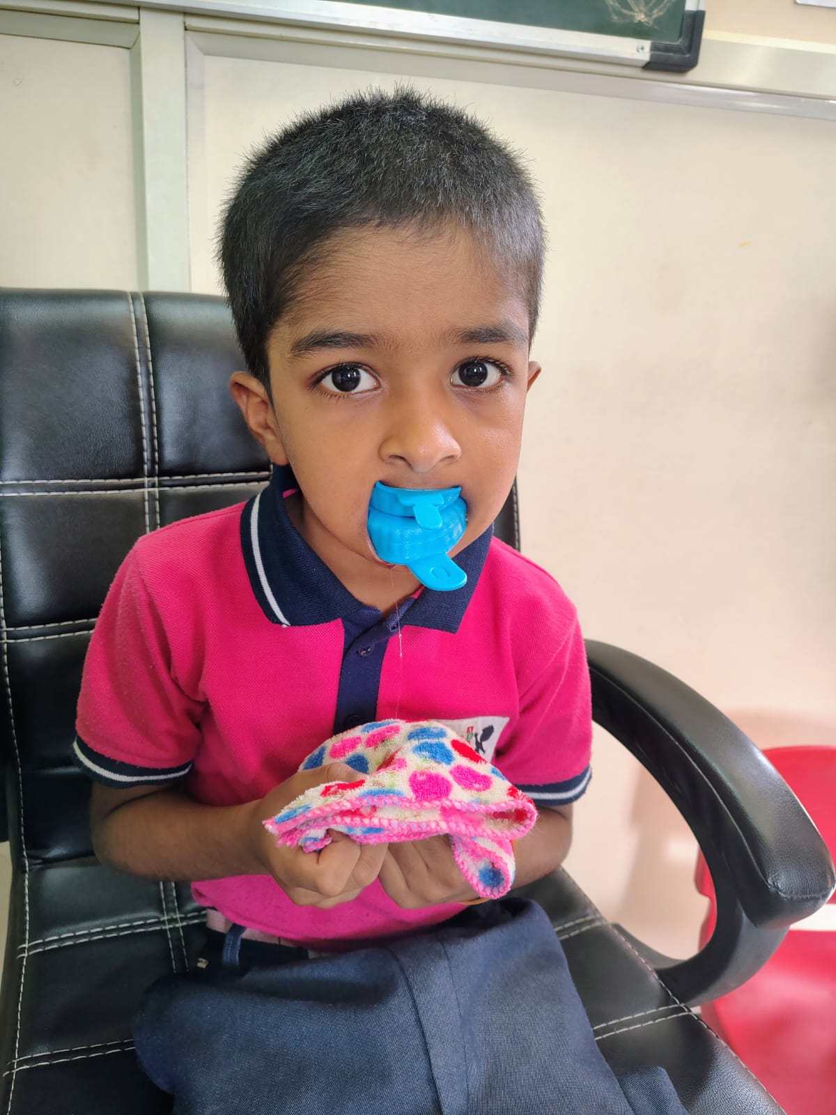 Boy receiving a fluoride application
